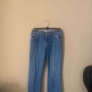 Vintage Levi's 550 Women's Classic Relaxed Boot Cut Jeans Medium Wash